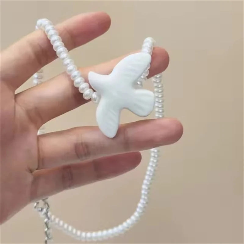 Xialuoke Adjustable Rope Chain Ceramic White Peace Dove Necklace For Women Fashion Pearl Beads Long Necklace Party Jewelry Gift